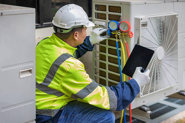 Professional Air Conditioning Repair technician working in Hampton Falls, NH